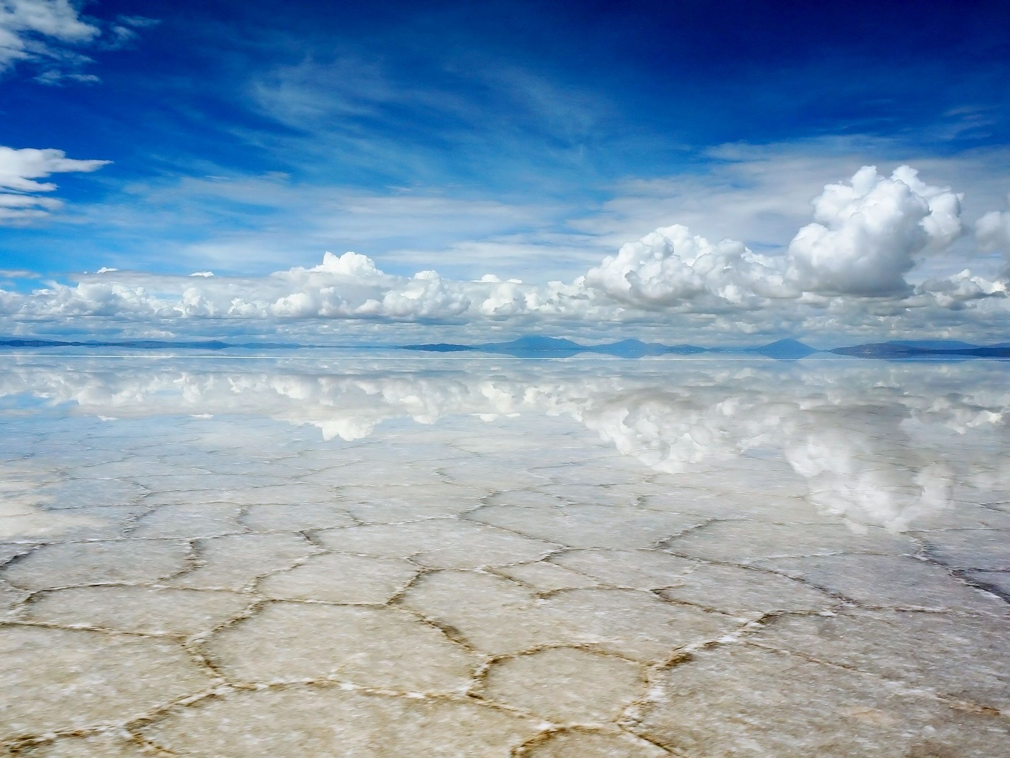 Reflective white surface of Salar de Uyuni in Bolivia