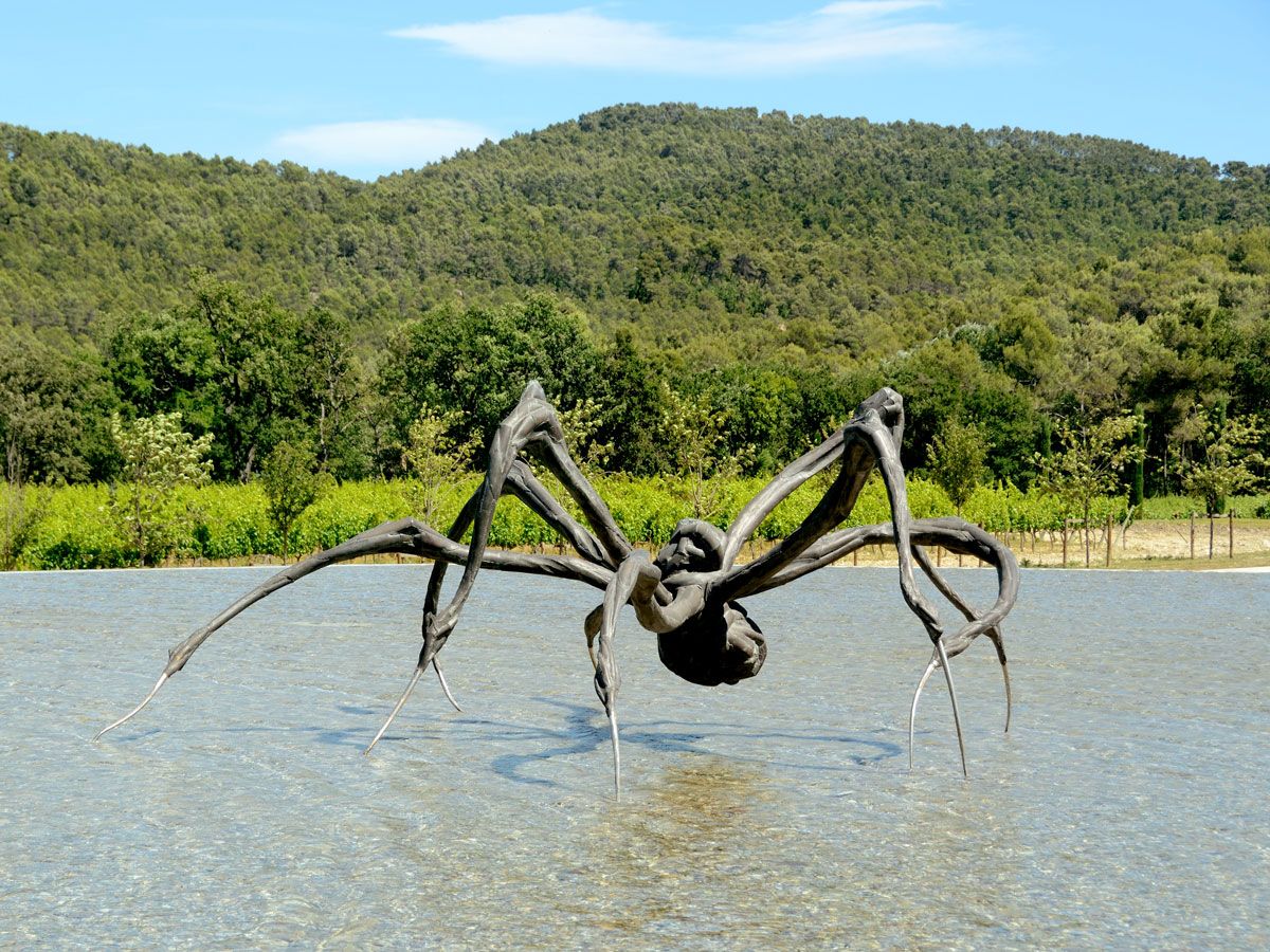 Giant spider sculpture in lake at France's Château La Coste