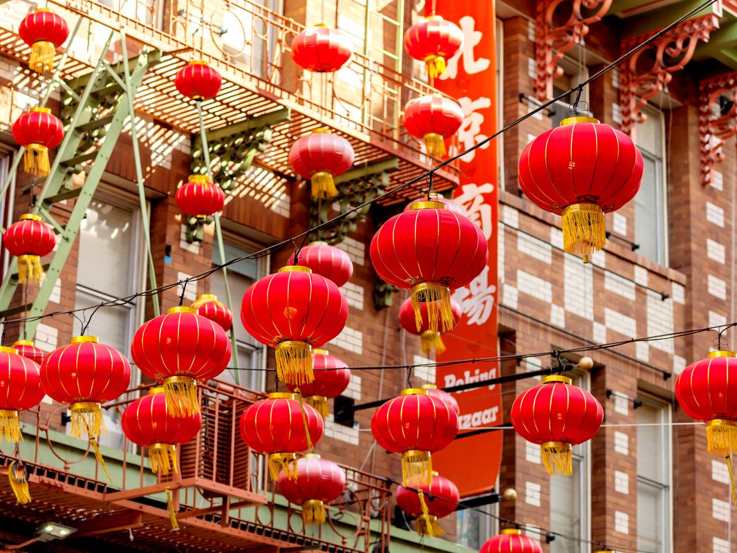 Red balloons hanging across street in San Francisco, California's Chinatown