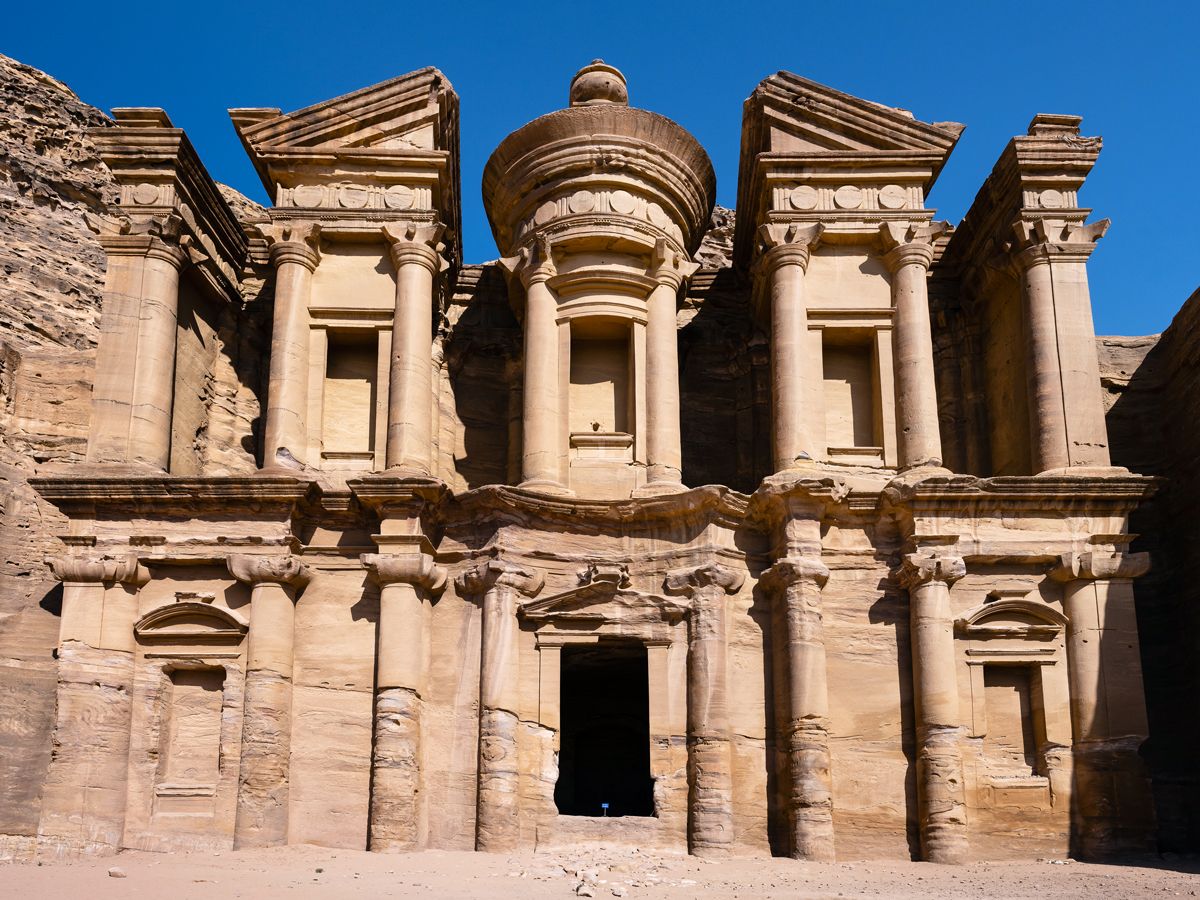 Rock-carved facade of the Treasury building in Petra, Jordan