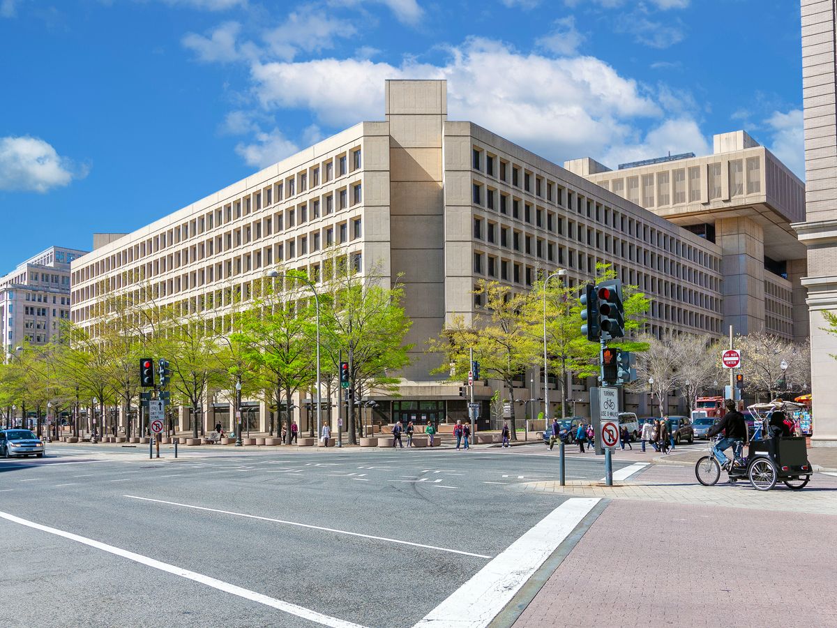 View of J. Edgar Hoover Building in Washington, D.C. across intersection