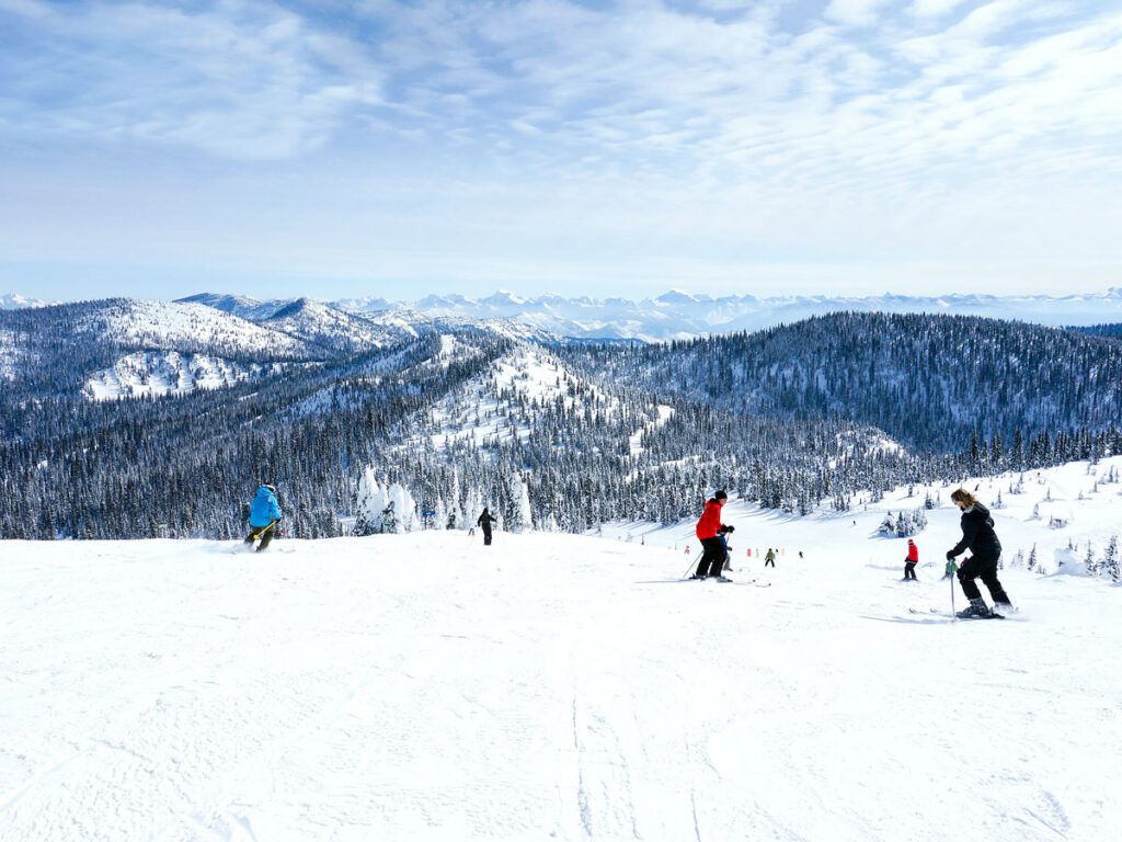Skiers on slopes in Whitefish, Montana