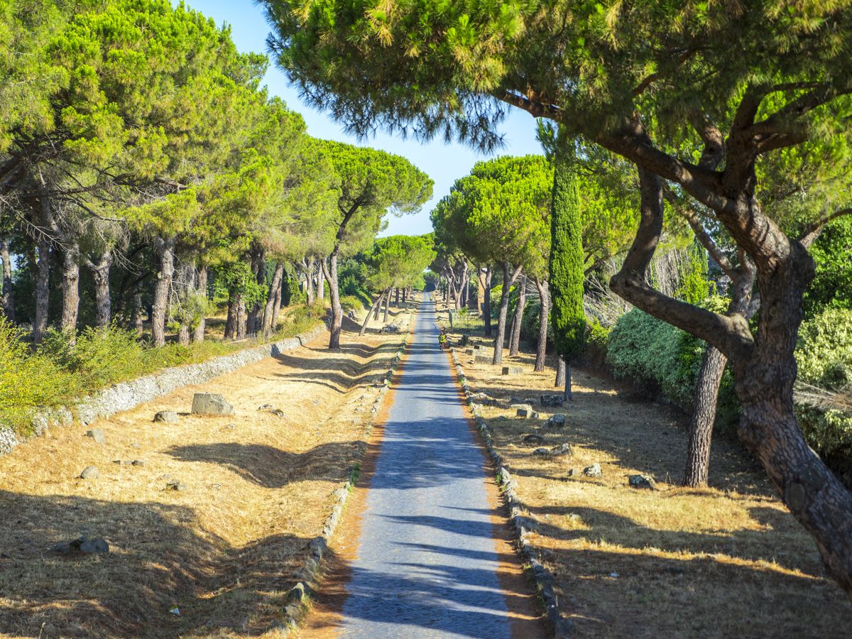 Appian Way in modern-day Italy lined with trees
