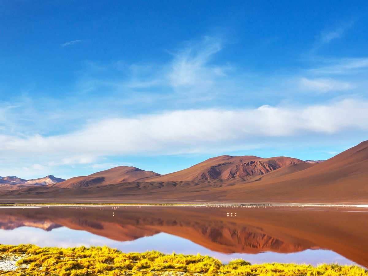 Mountains reflected on lake in the Altiplano in South America