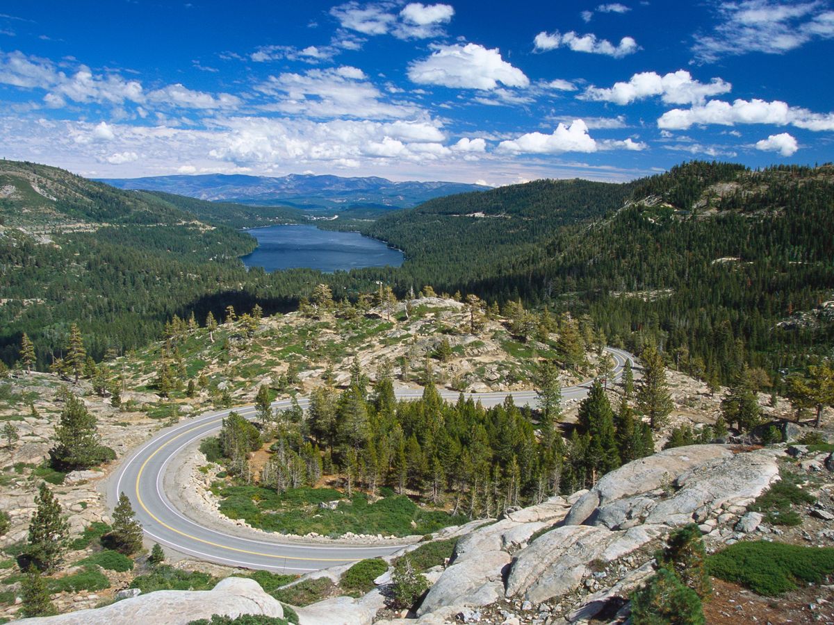 Road winding down mountain toward Donner Lake, California