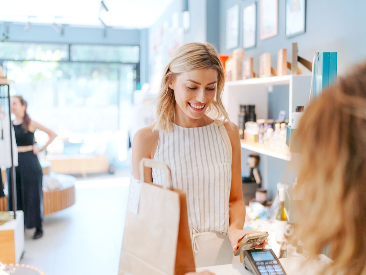 Shopper making purchase in retail store