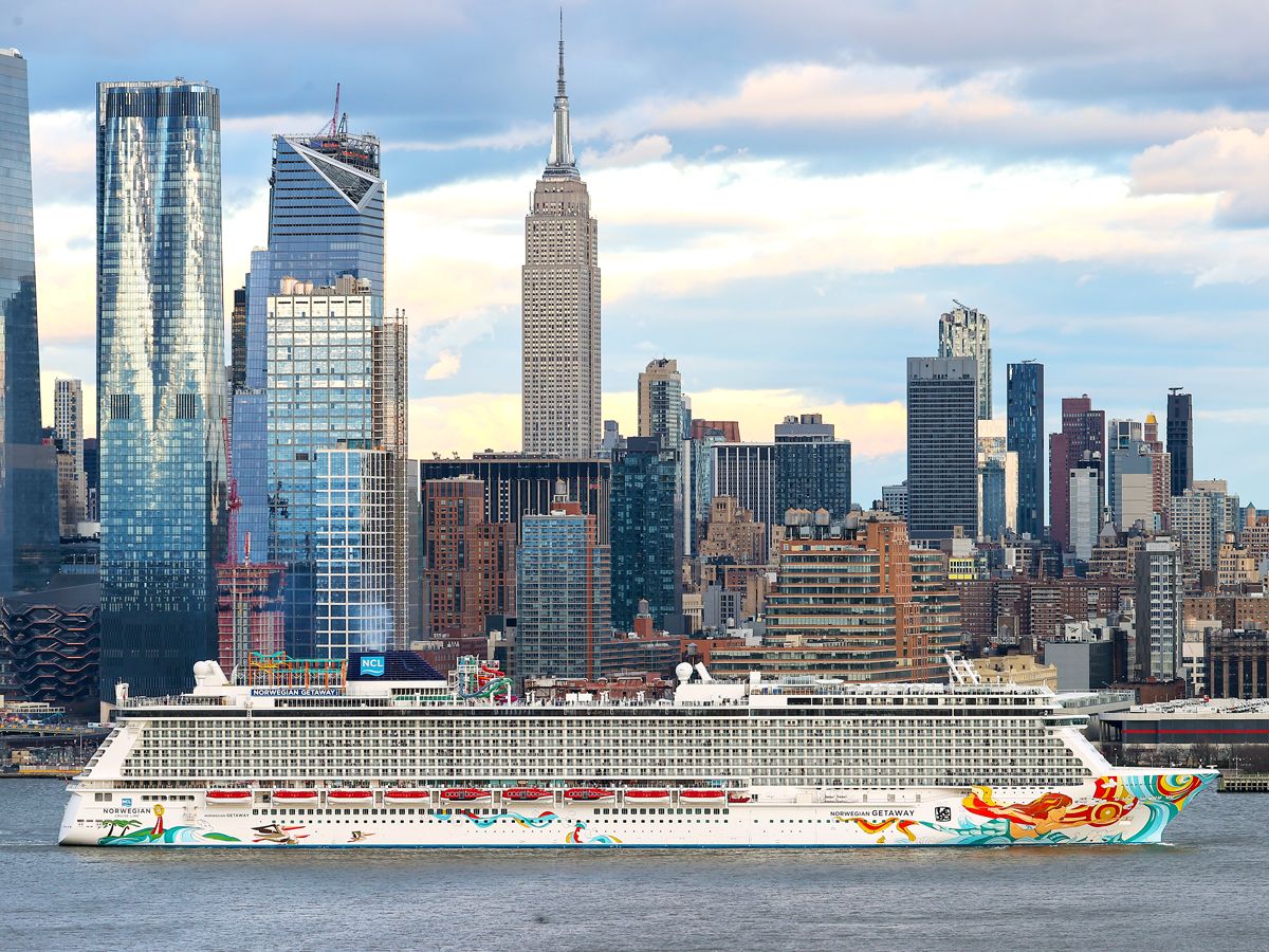 Cruise ship in Hudson River with Manhattan skyline in background