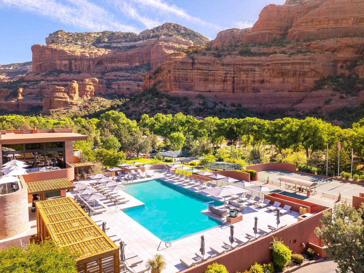 Pool at Enchantment Resort surrounded by red rock formations of Sedona, Arizona