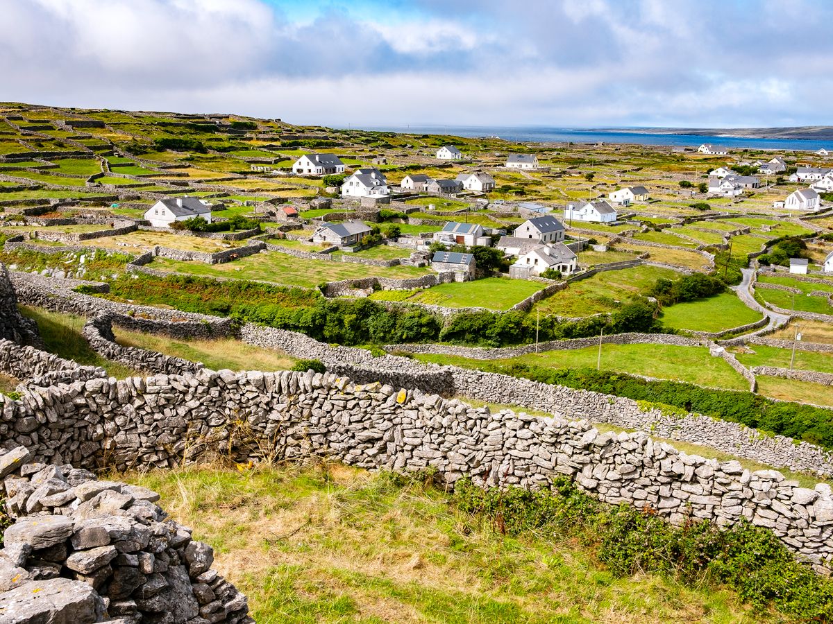 Homes scattered on hillside in Aran Islands, Ireland