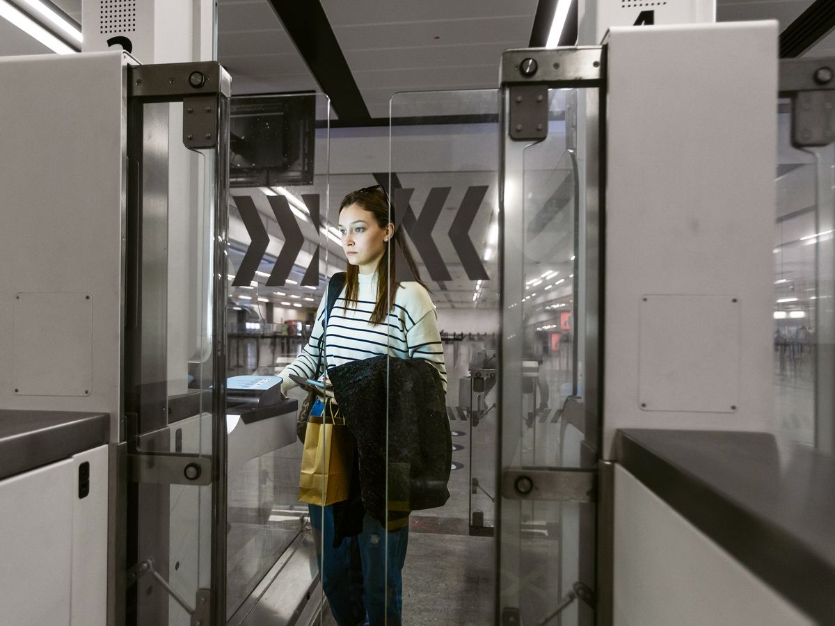 Traveler using automatic border control checkpoint