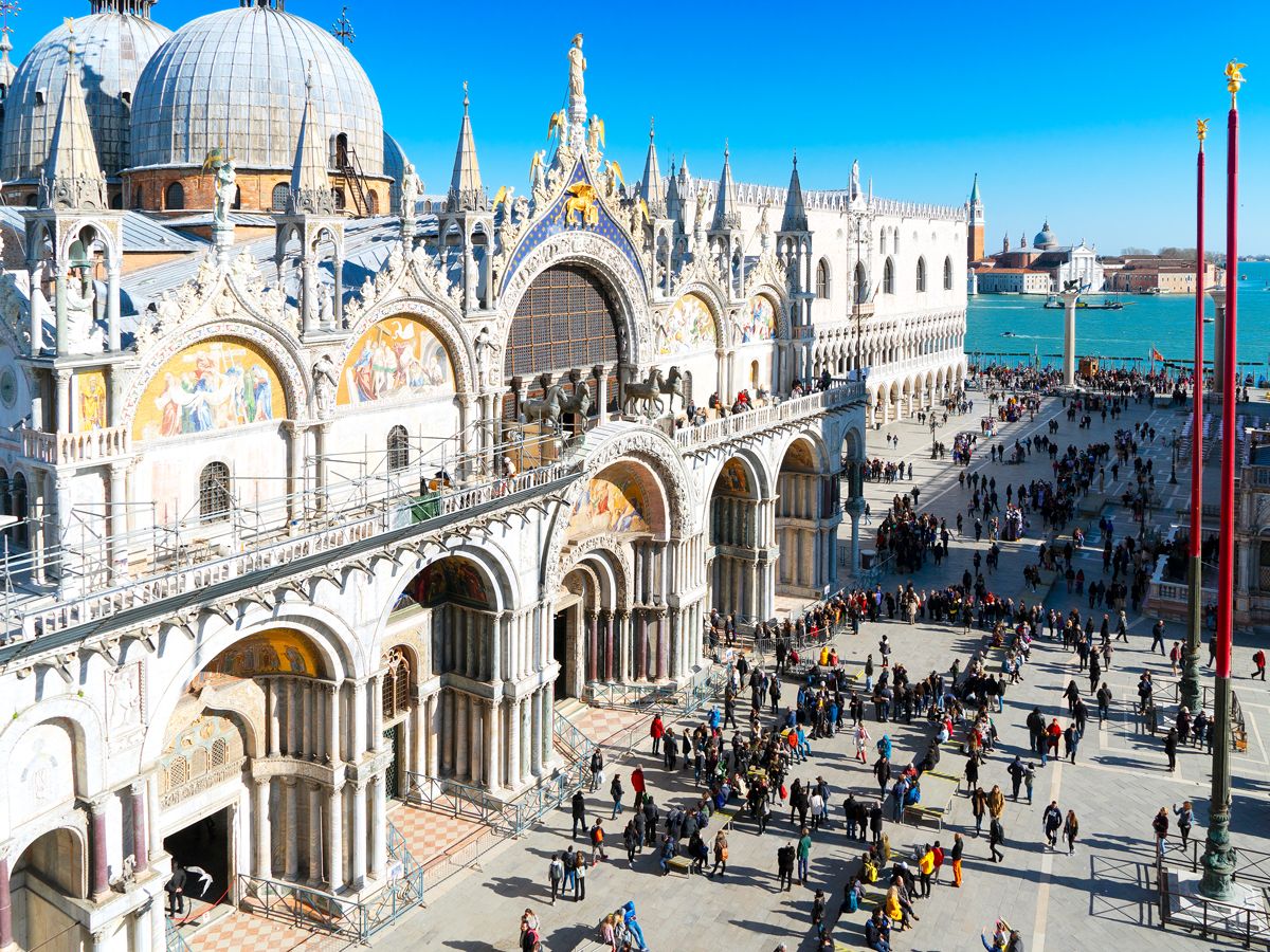 Crowds of tourists in front of Cathedral of San Marco in Venice, Italy