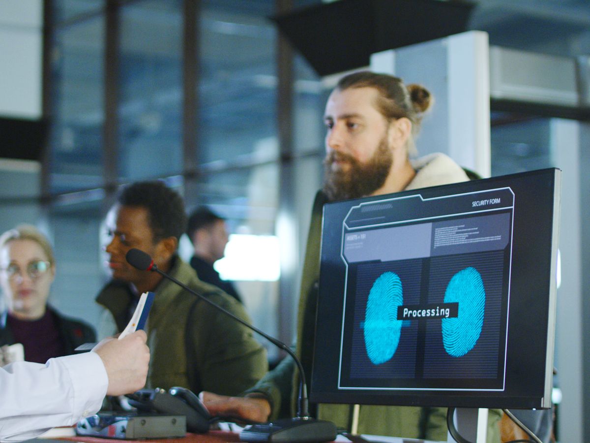 Traveler being screened at customs checkpoint