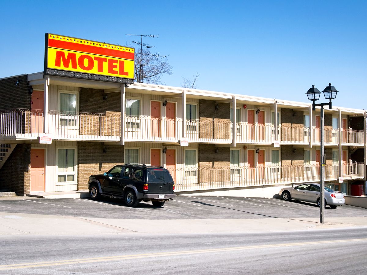 Cars parked in front of motel