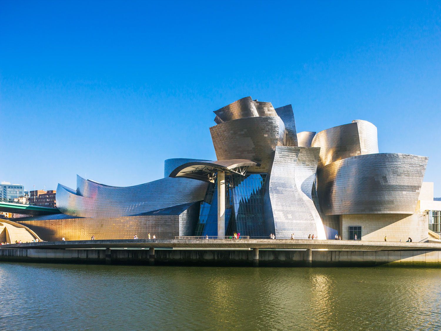 Guggenheim Museum of Bilbao, Spain, seen across water