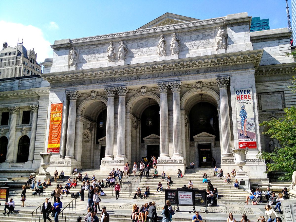 People gathered on the steps of the New York Public Library in midtown Manhattan