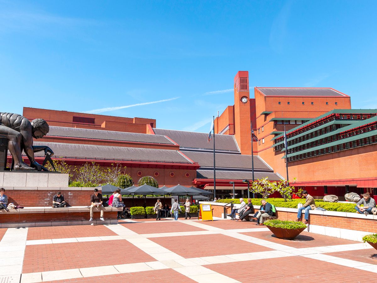 People reading outside the British Library in London, U.K.