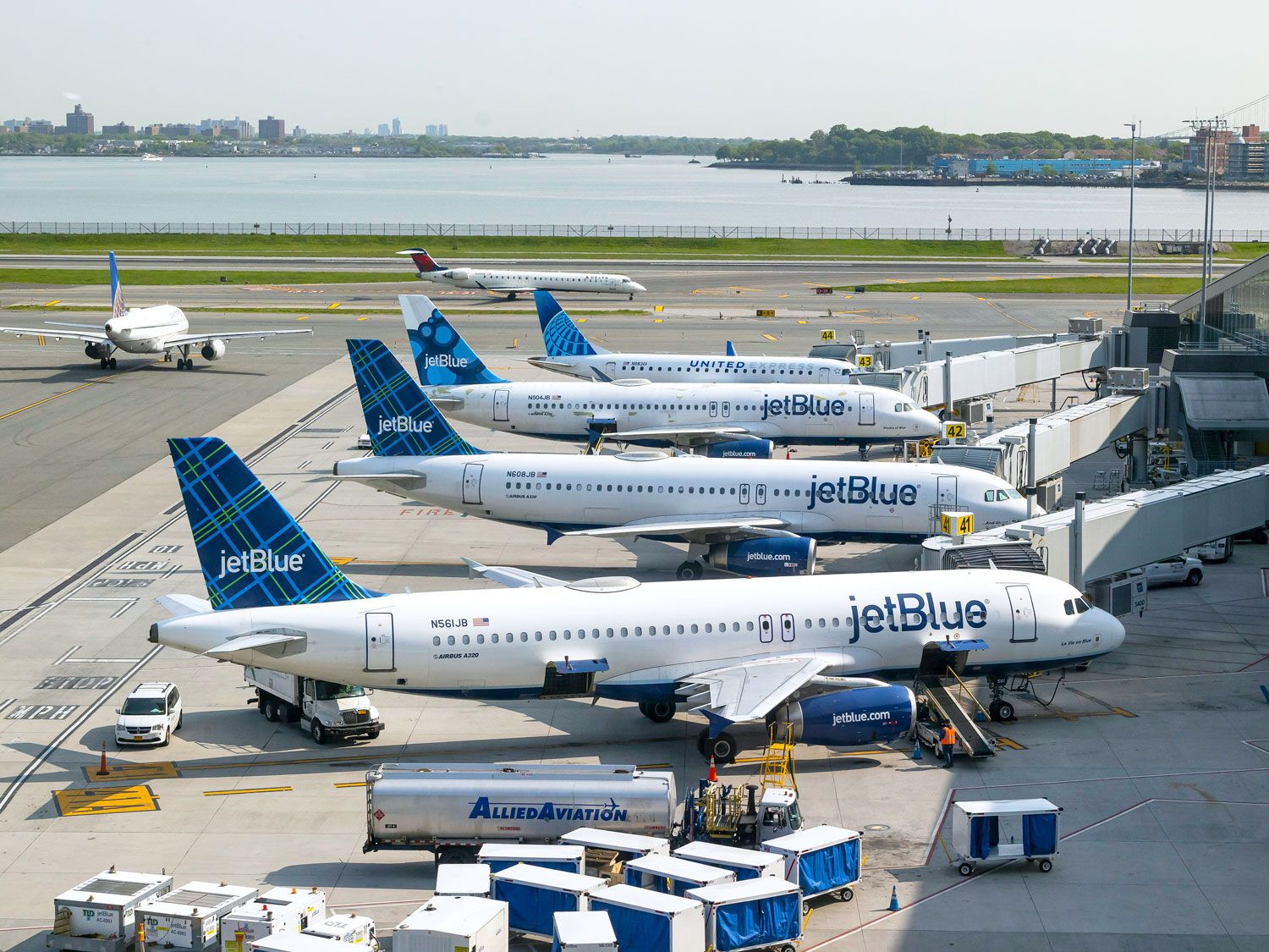 JetBlue aircraft parked at gates at New York's LaGuardia Airport
