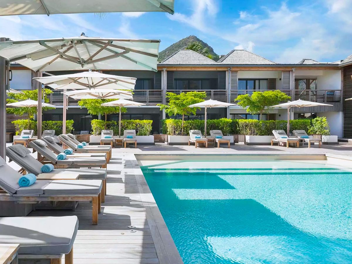 Loungers beside pool at Le Barthélemy Hotel & Spa in St. Barts