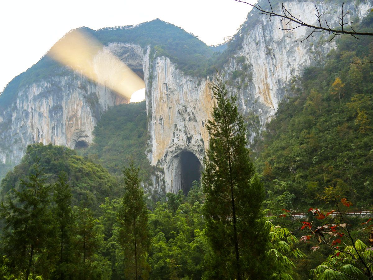 Sun shining through Dachuandong Arch in China