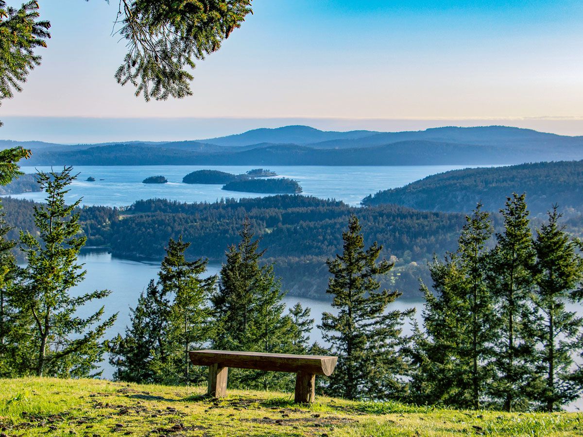 Bench on hilltop overlooking the San Juan Islands in Washington