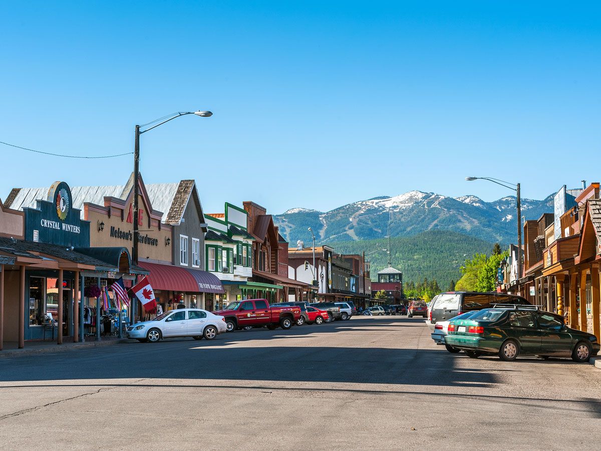 Main street in Whitefish, Montana, with view of mountains