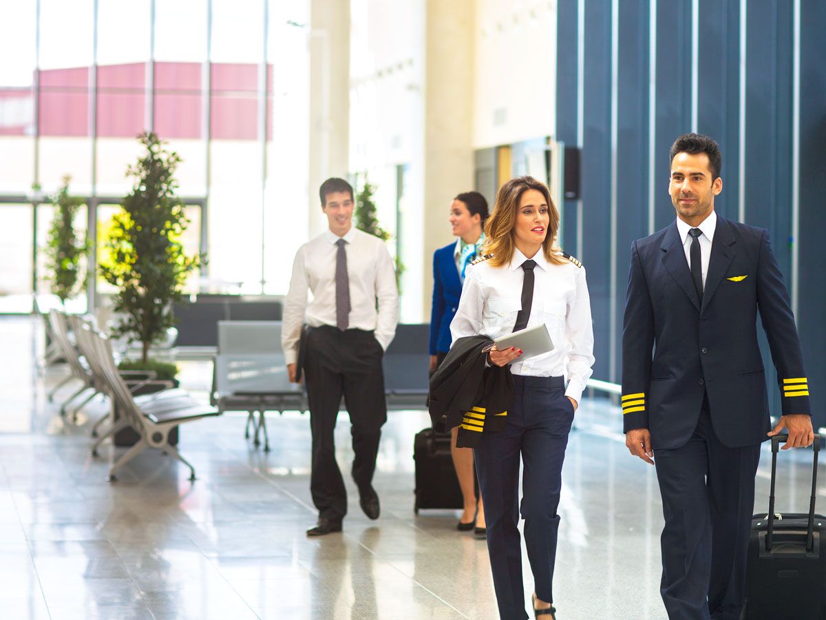 Flight crew walking through airport