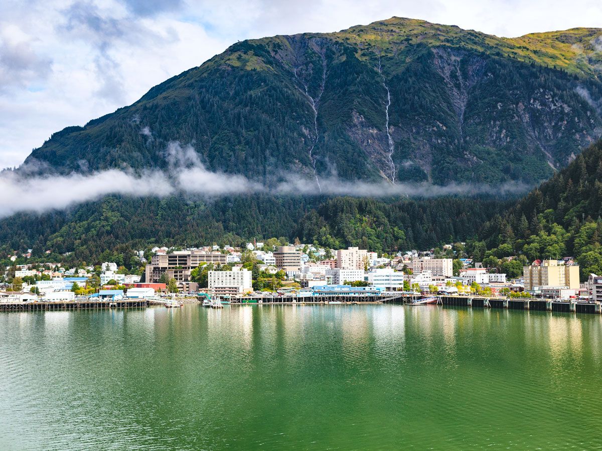 View across bay of Juneau, Alaska, with mountains looming behind