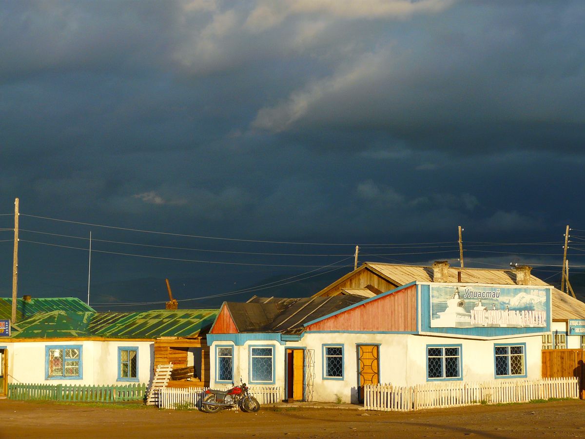 Storm clouds over homes in Tosontsengel, Mongolia