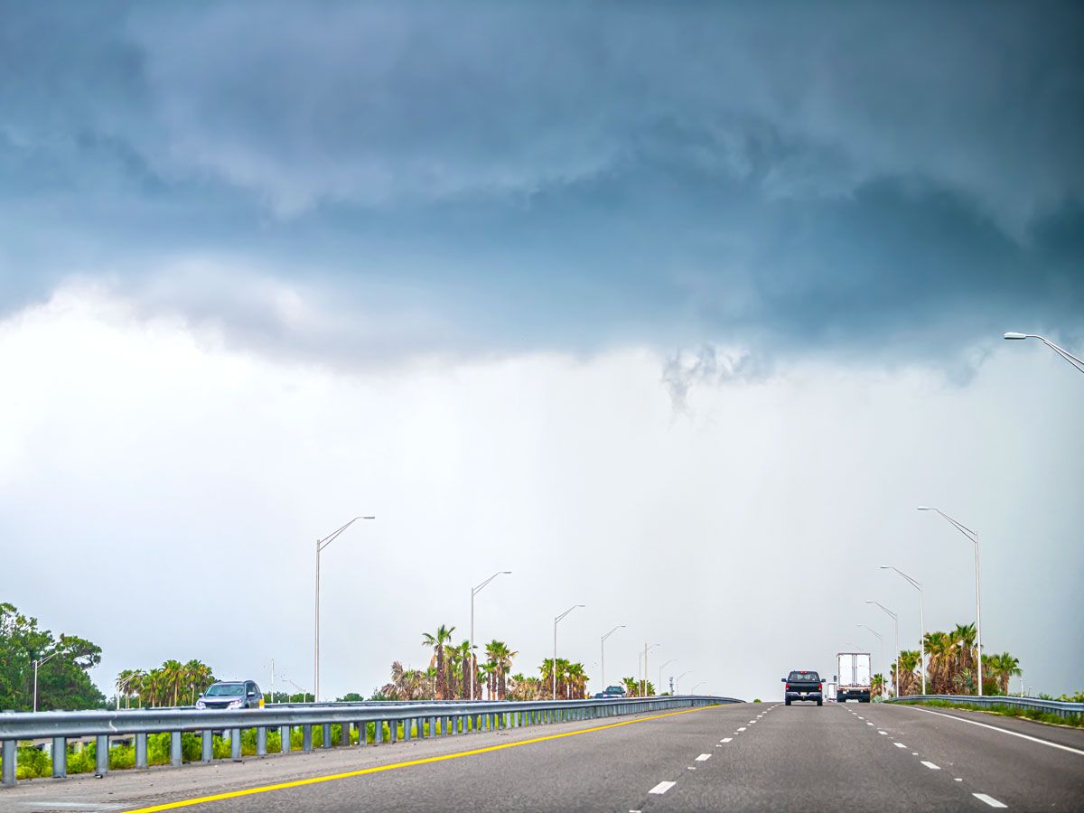Storm clouds over Orlando highway