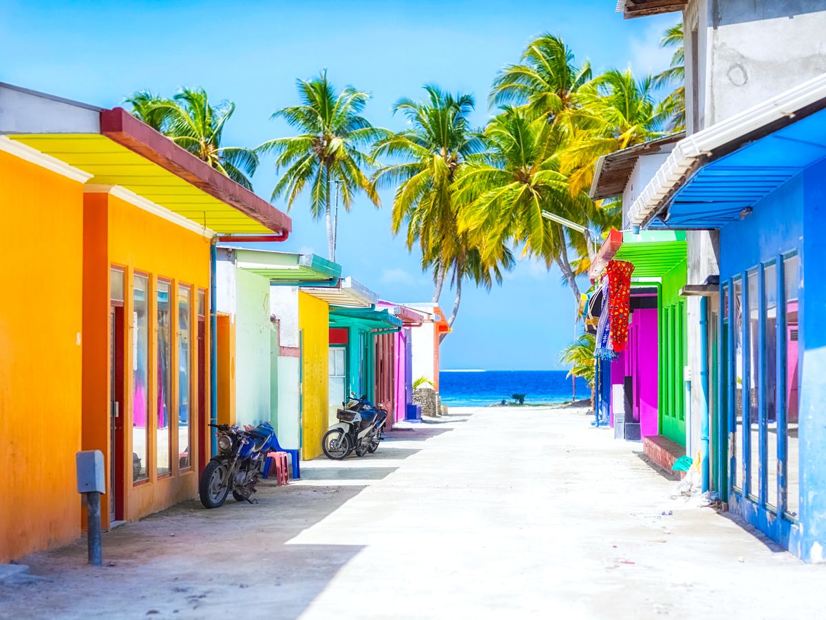 Colorfully painted buildings with view of the sea in the Maldives