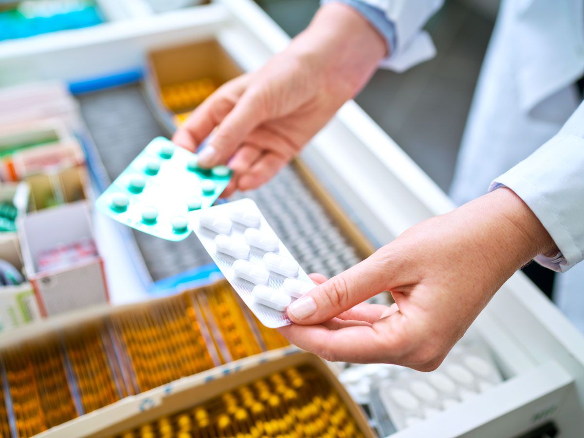 Person holding medicine