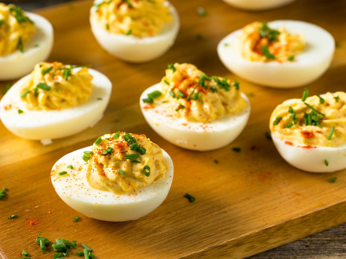Deviled eggs on cutting board