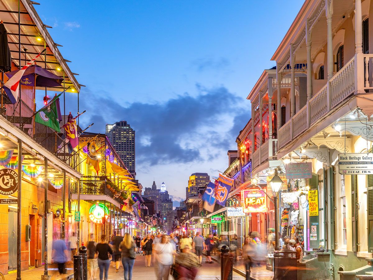 Evening crowds on Bourbon Street in New Orleans, Louisiana