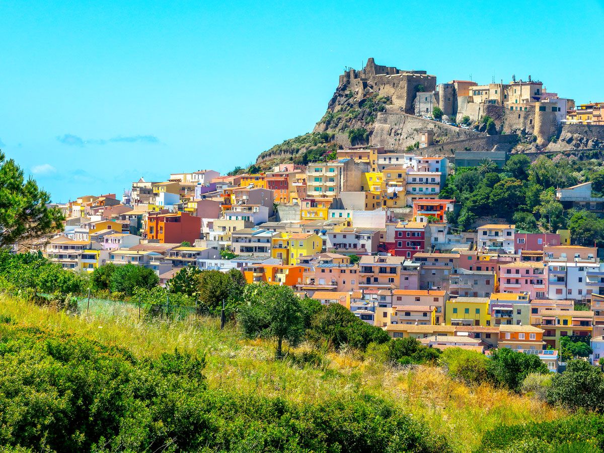 Colorful hillside homes in the distance on the Italian island of Sardinia