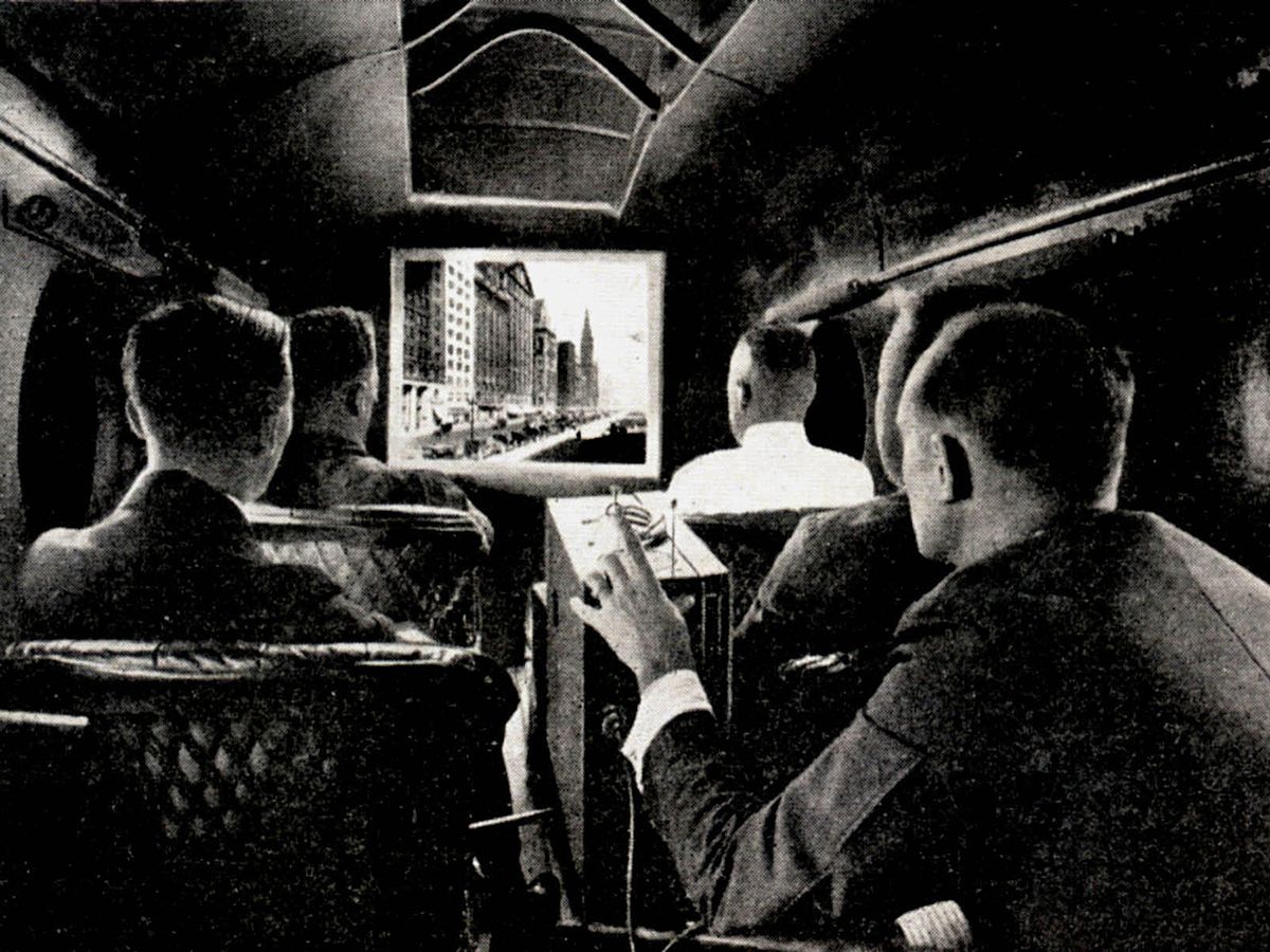 Vintage photo of projector showing in-flight movie