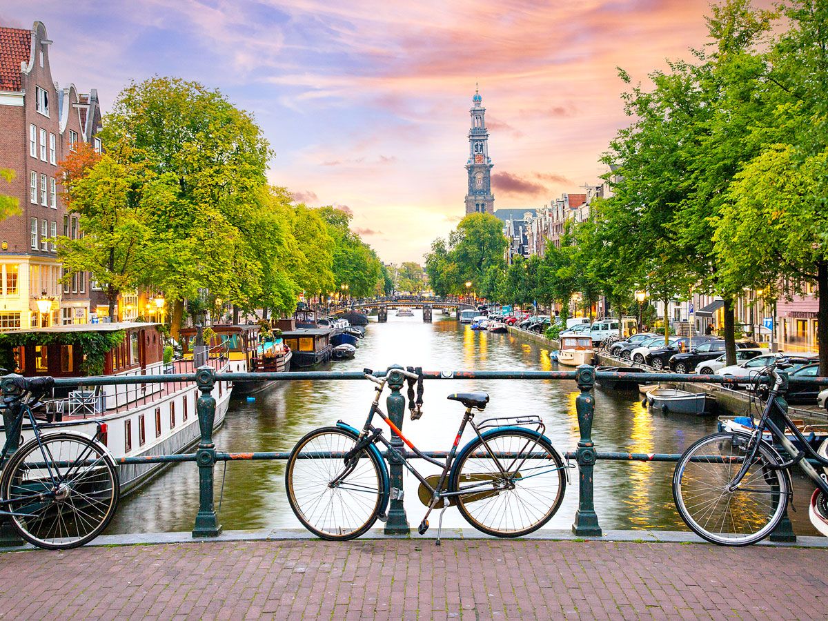 Bikes parked on canal bridge in Amsterdam, the Netherlands