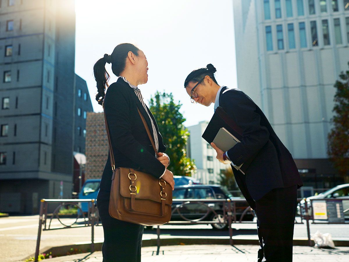 Businesspeople greeting each other in Tokyo