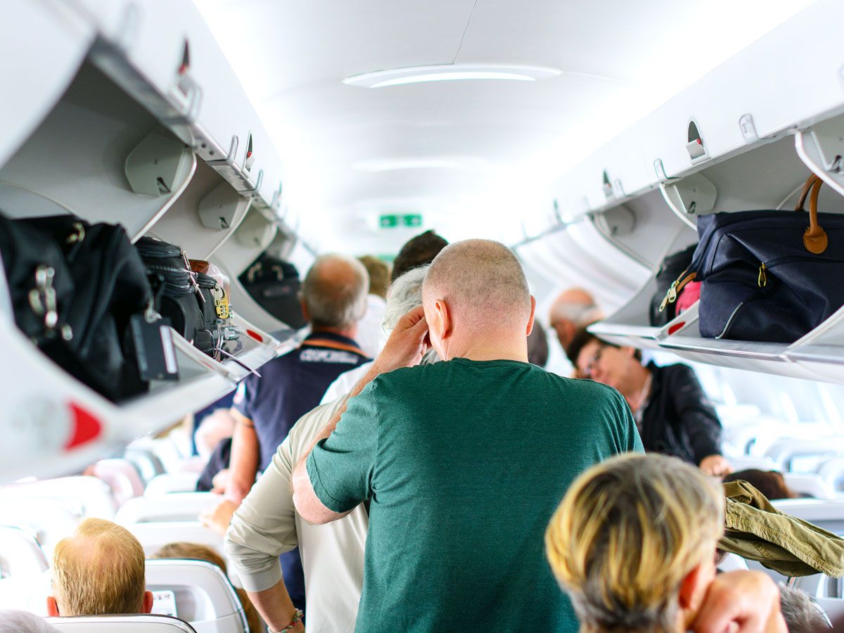 Passengers waiting to deplane