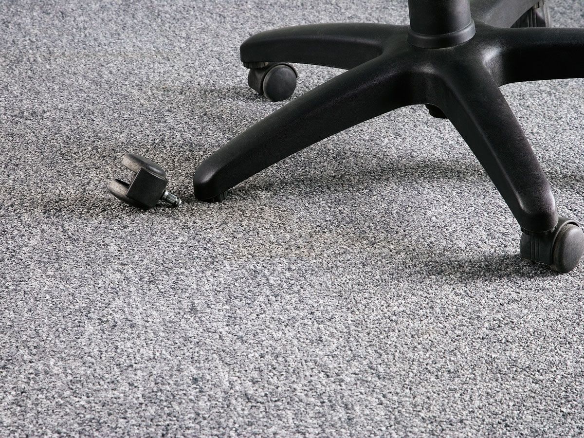 Desk chair with detached wheel