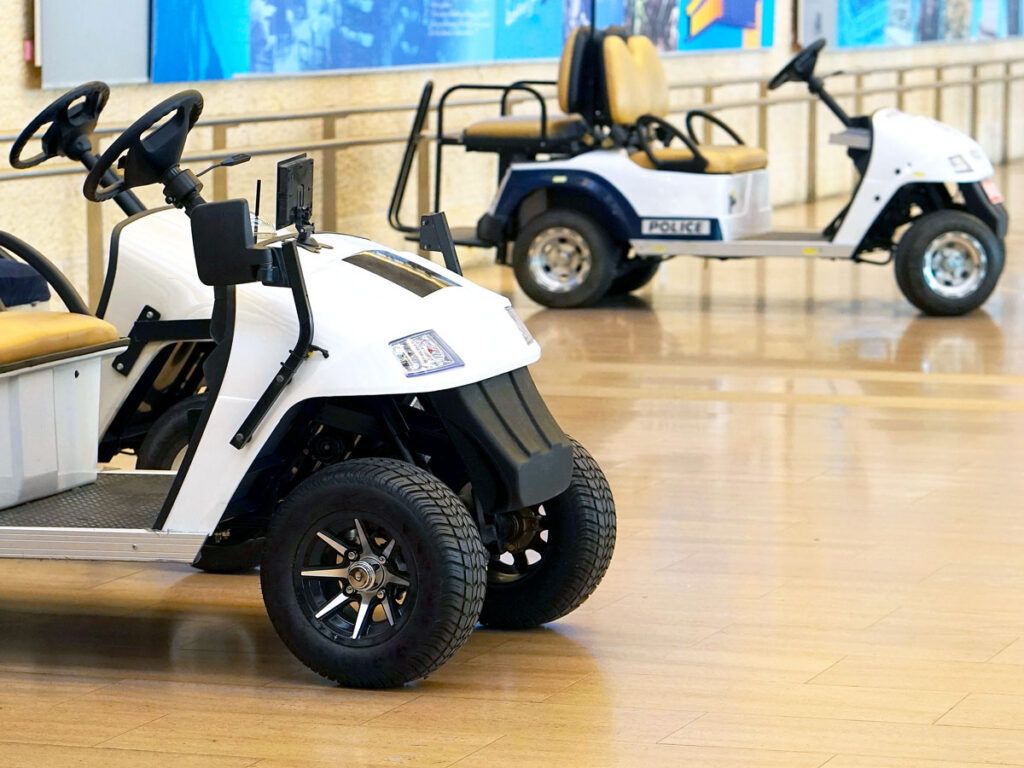 Courtesy and police carts in airport terminal