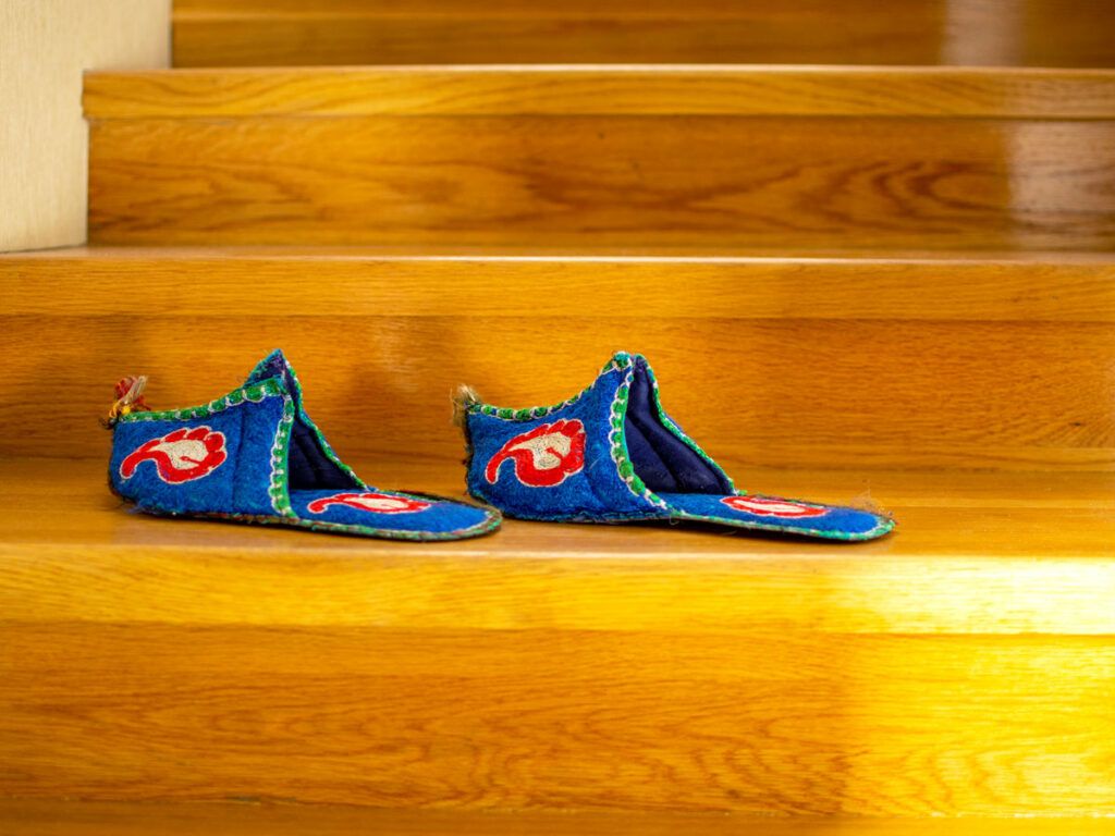Turkish slippers on oak staircase