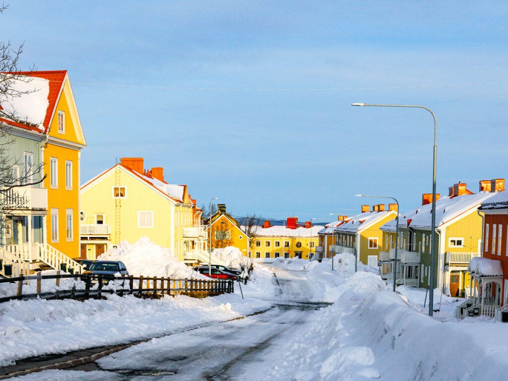 Snow-covered residential street in Sweden