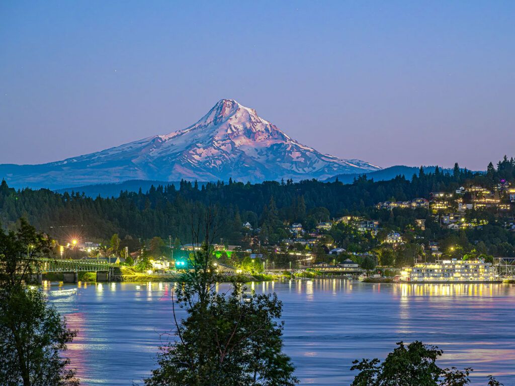 Mount Hood towering over Hood River, Oregon, seen at dusk