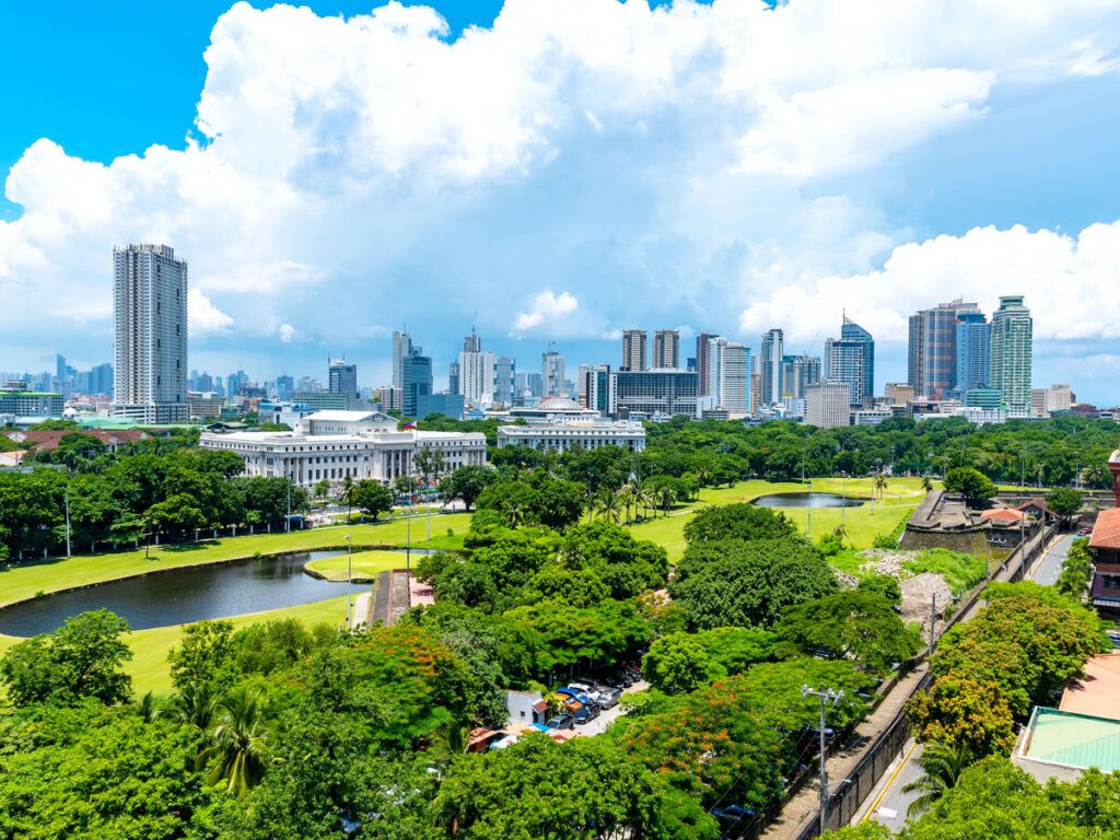 Aerial view of park and high-rises in Manila, the Philippines 