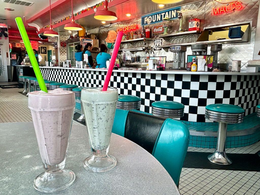 Milkshakes on table inside Albuquerque's 66 Diner