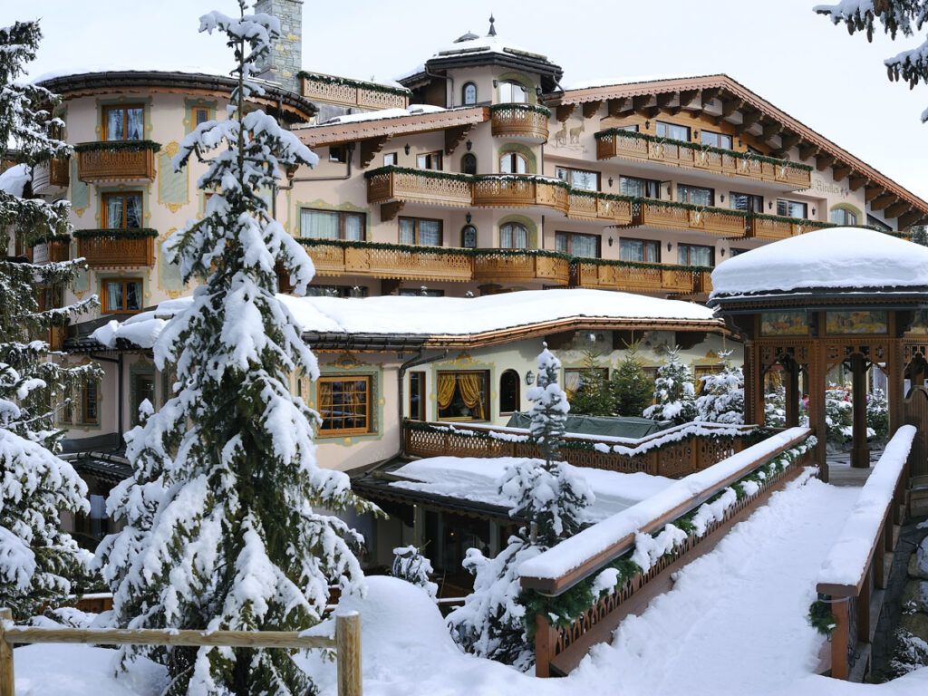 Snow-covered grounds of Hotel Les Airelles, Courchevel Ski Resort