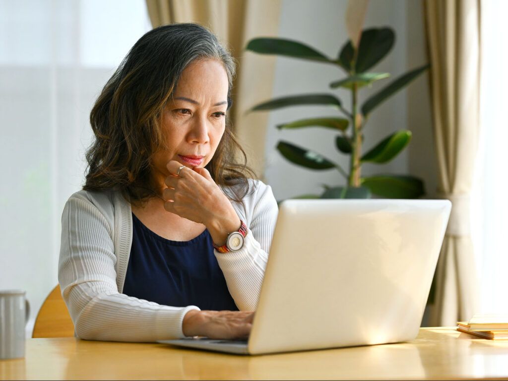 Woman using laptop computer