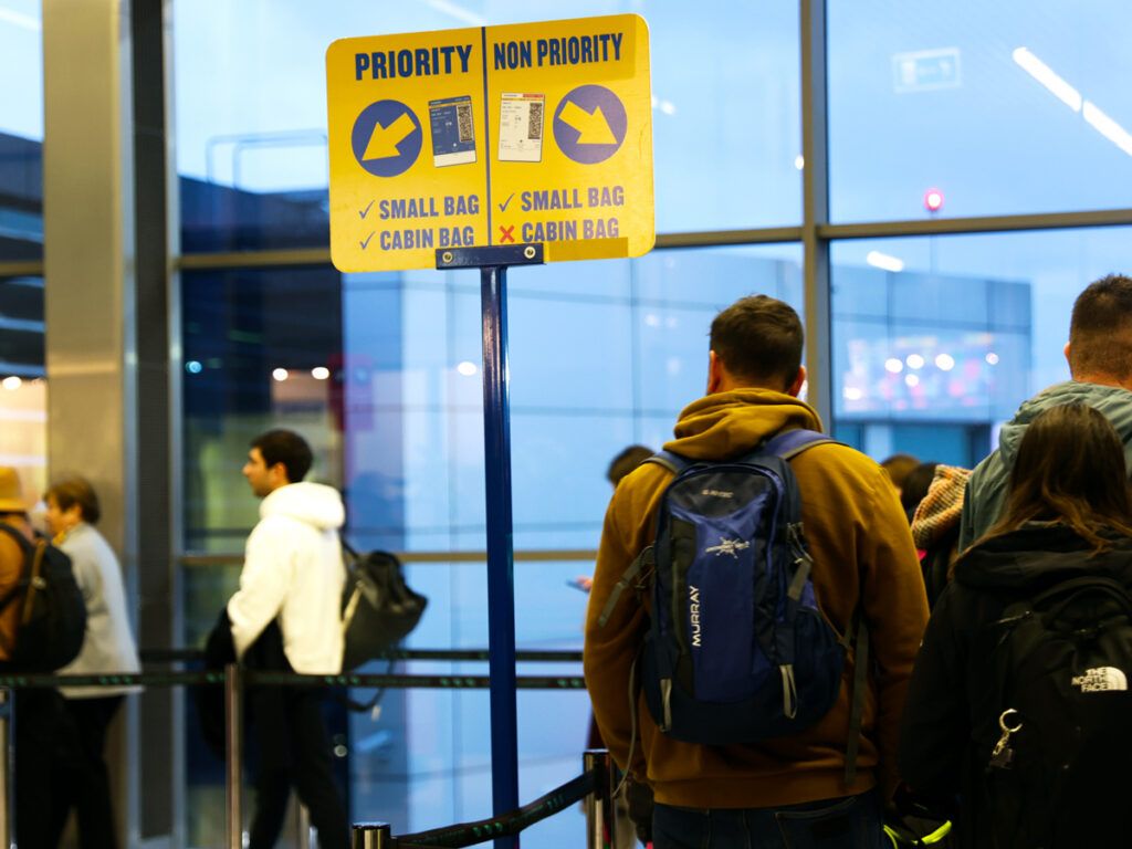 Passengers lining up to board aircraft