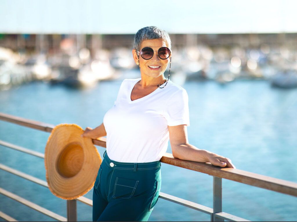 Traveler relaxing on deck of cruise ship