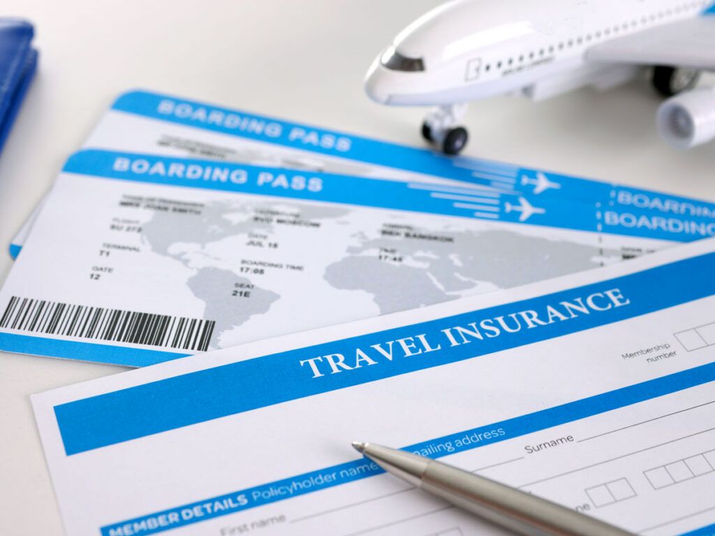 Pen and form for travel insurance application